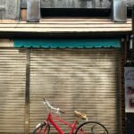 red and gray bicycle